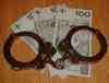 thumb_0802_banknoty_i_kajdanki.jpg